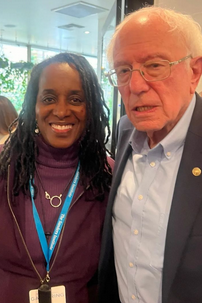 Jovanka Beckles with Bernie Sanders at housing policy planning event
